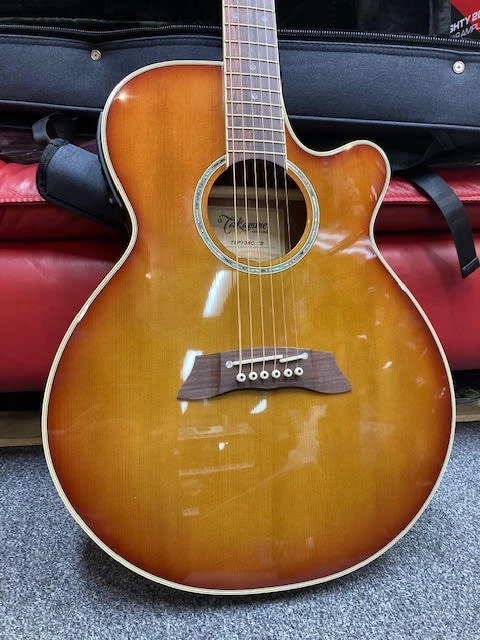 GUITARS Takamine Thinline Series AC/EL Guitar With Cutaway In Gloss Tea Burst Finish 5 GUITARS Takamine Thinline Series AC/EL Guitar With Cutaway In Gloss Tea Burst Finish